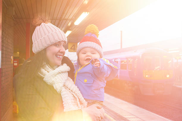 istock mother and child catch the train 507833508