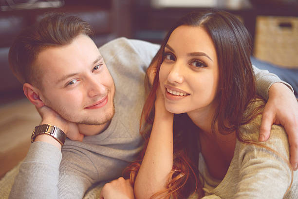 istock Young beautiful couple in home interior 507834572