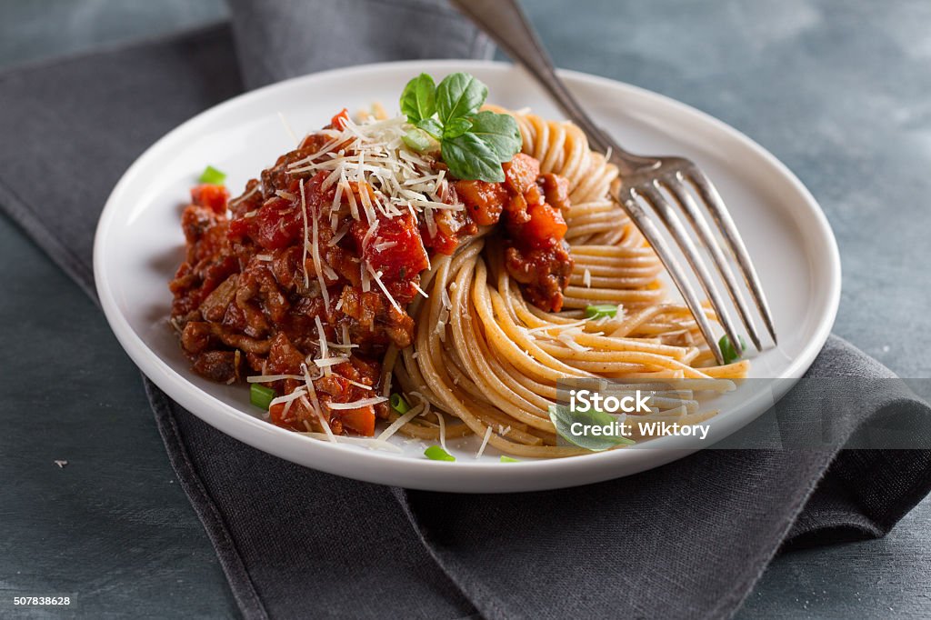 Wholegrain pasta spaghetti Wholegrain pasta spaghetti with vegetable sauce, selective focus Wholegrain Stock Photo