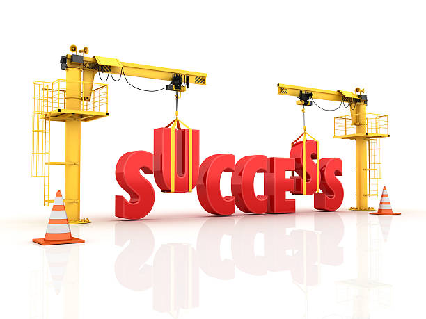 istock Cranes building the SUCCESS Word 507843074