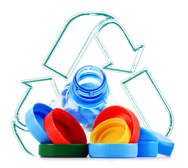 istock Recycling sign with plastic bottles and caps 507843424