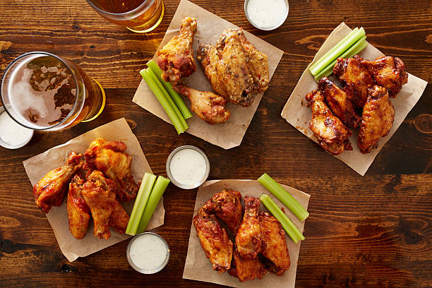 istock many different flavored buffalo chicken wings with beer 507845200