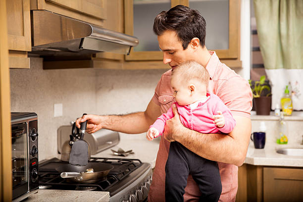 istock Father and baby daughter cooking breakfast 507845458
