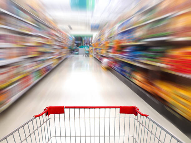 istock supermarket shelves aisle blurred background 507845898