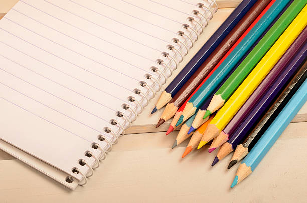 istock Notebook and colorful pencils 507846860