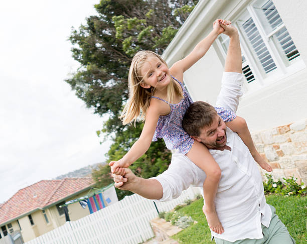 istock Father and daughter playing outdoors 507848504