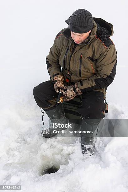 Ice Fishing Stock Photo - Download Image Now - Fisherman, Men, Activity