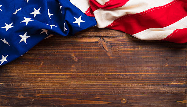 istock Old American Flag on wooden plank background 507850164