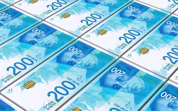 istock Israeli Shekel bills stacks background. 507850760