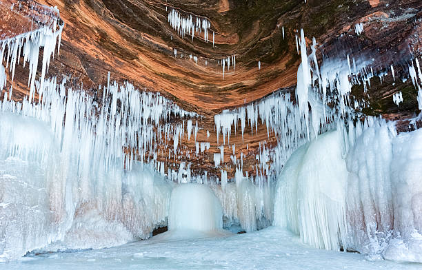 Ice Cave Icicles and Ice Cave   bayfield county stock pictures, royalty-free photos & images