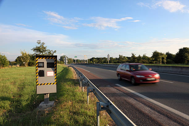 Speed camera Speed camera at the road side radar stock pictures, royalty-free photos & images