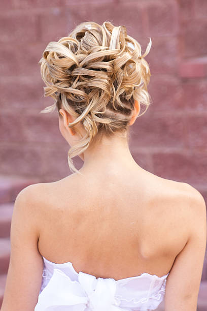 istock Back view of elegant wedding hairstyle 507854335
