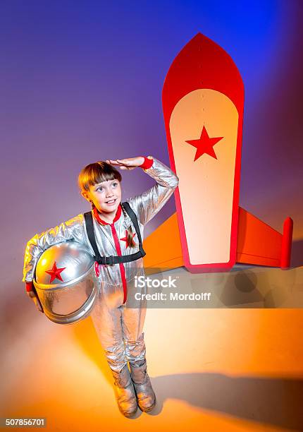 Saluting Astronaut Stock Photo - Download Image Now - Child, Colored Background, Dressing Up