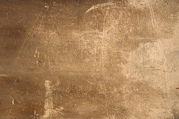 istock Texture of old wall with yellow stucco 507856831