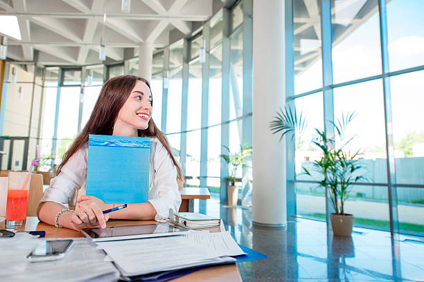 istock Girl studying in the University canteen with Fresh and cake 507857507