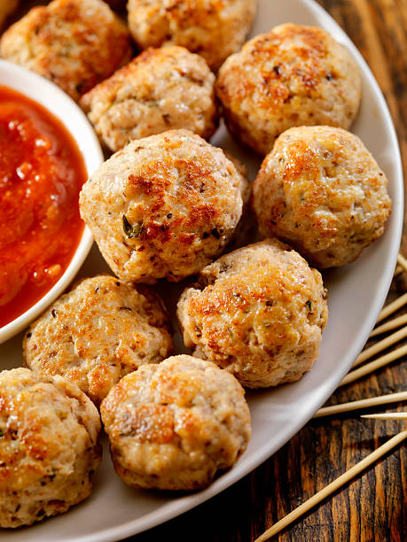 Turkey Meatballs Italian Style Turkey Meatballs with a Marinara Sauce for Dipping-Photographed on Hasselblad H3D2-39mb Camera chicken balls stock pictures, royalty-free photos & images