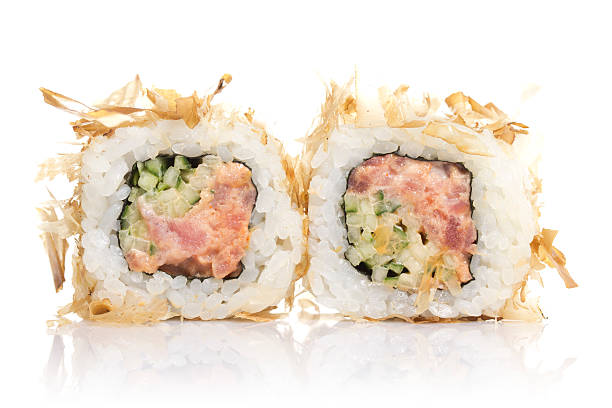 istock Sushi roll with tuna shavings isolated on white background 507860003