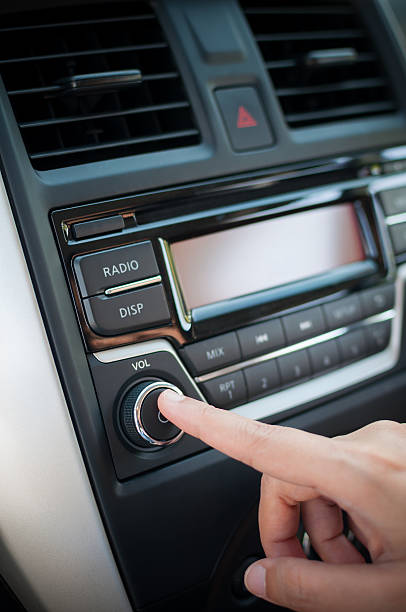 istock Driver finger pushing button of car audio player. 507864138