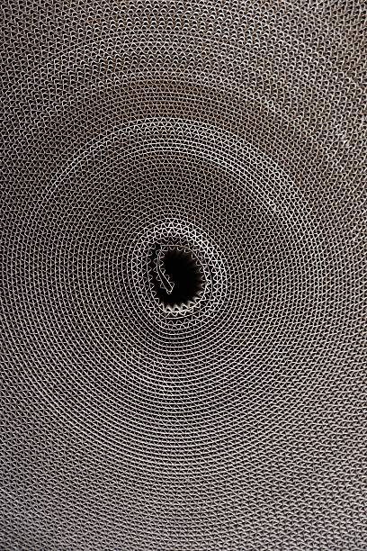 istock abstract roll of corrugated paperboard 507864786
