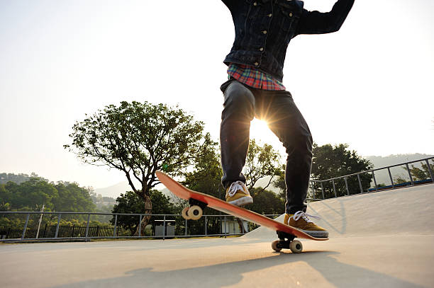 istock skateboarding at sunrise skatepark 507864962