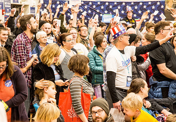 2016 Iowa Caucus In Iowa City Iowa City, United States- February 1, 2016: Heavy turnout for the 2016 Democratic Iowa Caucus in Precinct 14 at Mark Twain Elementary School in Iowa City, Iowa with relatively mild for a January Iowa night. hillary clinton stock pictures, royalty-free photos & images