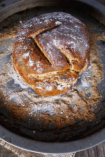 istock Homemade rustic bread over wooden background 507870168