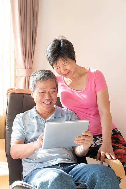 istock Happy Senior couple with tablet 507872668