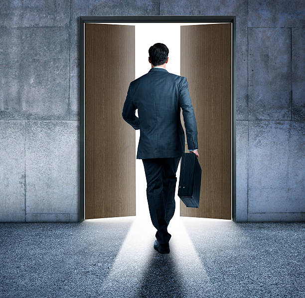 istock Bsuinessman About To Walk Through Open Doors 507873882