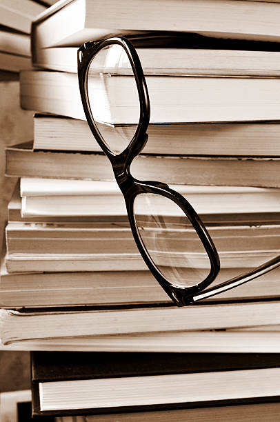 istock books and eyeglasses, in black and white 507875915