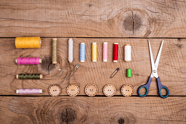 istock top view of sewing accessories arranged on old vintage board 507876618