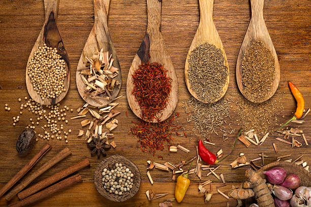 istock Selection of spices on a wooden background 507878109