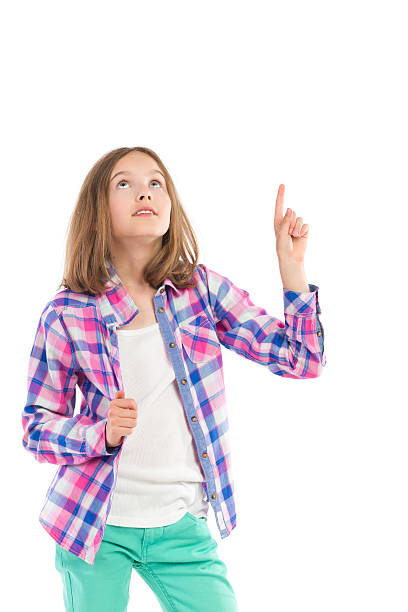 istock Little girl pointing up 507878701