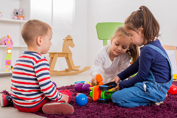 istock Kids playing in the room 507878945