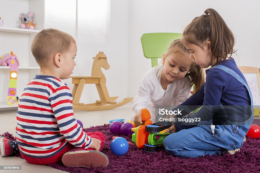 Kids playing in the room Activity Stock Photo