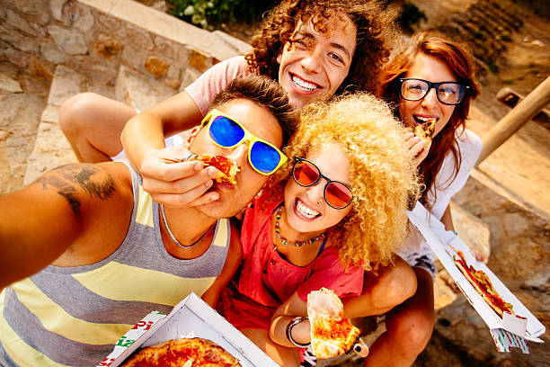 istock Friends Taking Selfie With Pizza 507879005