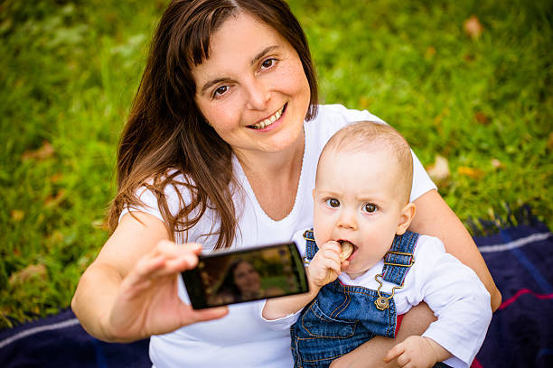 istock Mother and baby - capturing moments 507879130