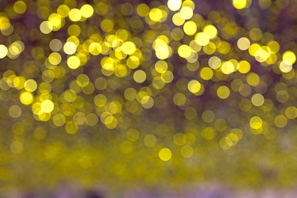 istock glitter vintage lights background. light gold and black. defocus 507879197