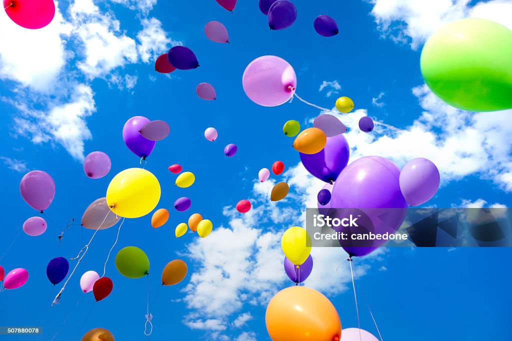 Colorful Balloons flying in the sky Colorful Balloons flying in the sky party Anniversary Stock Photo
