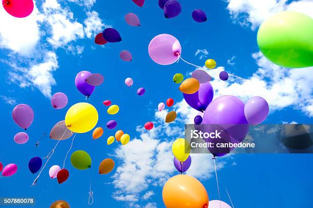 Colorful Balloons Flying In The Sky Stock Photo - Download Image Now - Anniversary, Arts Culture and Entertainment, Balloon