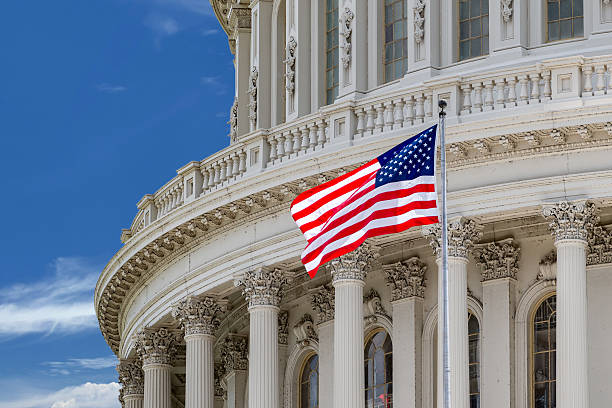 istock Washington DC Capitol detail on cloudy sky 507880876