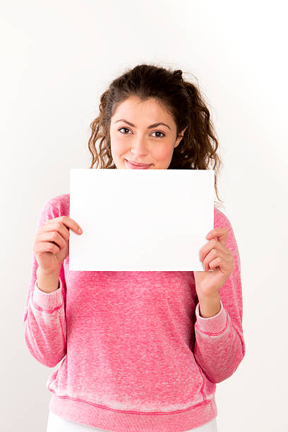 istock Young Woman with Blank Sign 507882081