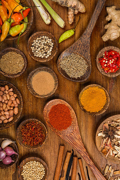 istock Spices background on a wooden background 507882399