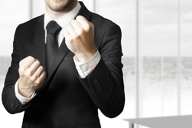 istock businessman fighter fists up 507896231
