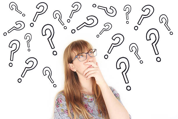 istock Teenage girl and question marks 507896507