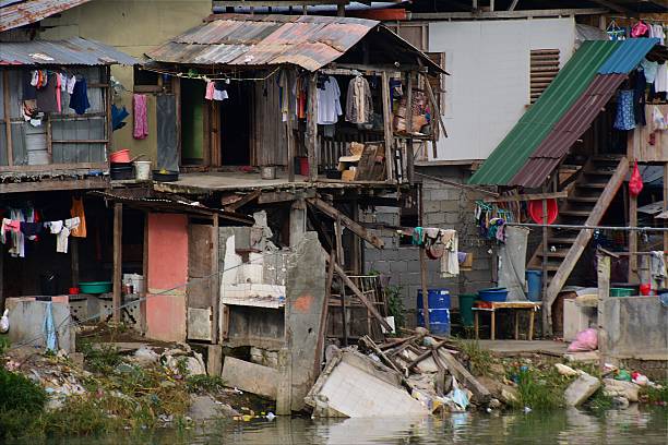 istock Stilt houses on Davao River, Mindanao 507897219