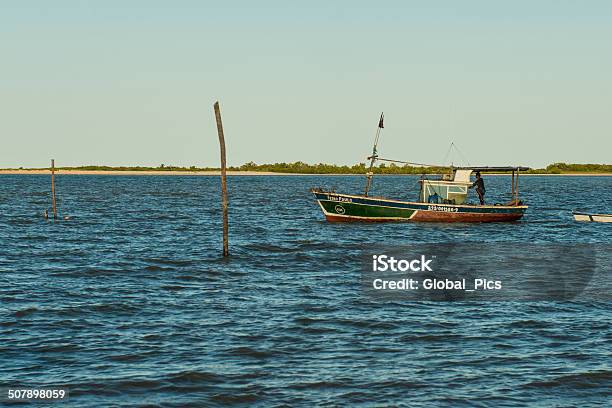 Fishing Boat Stock Photo - Download Image Now - Canoe, Green Color, Adult