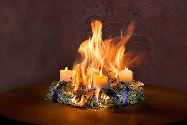 Advent wreath caught fire Advent wreath caught fire , got burned advent candle wreath adventskranz stock pictures, royalty-free photos & images