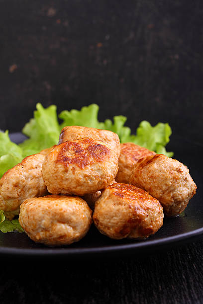 istock burgers with lettuce in a black plate 507898204