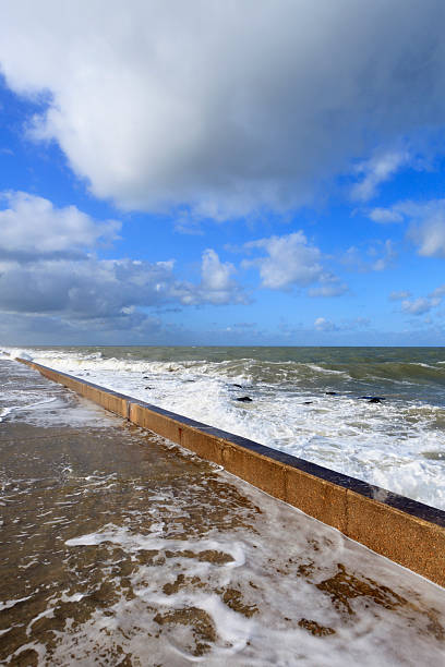 istock breaking waves on a jetty along the Nieuwe Waterweg river 507898667