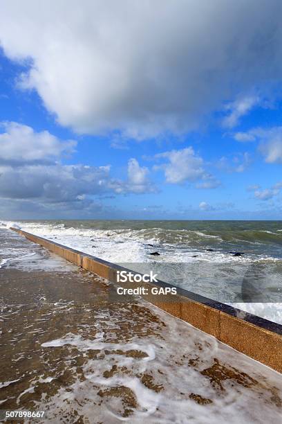 Breaking Waves On A Jetty Along The Nieuwe Waterweg River Stock Photo - Download Image Now